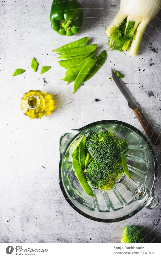 Green vegetables in a blender. View from above. Vegetable Mixer Raw Fresh Organic Healthy naturally Vegetarian diet Diet Soup Ingredients Food Table