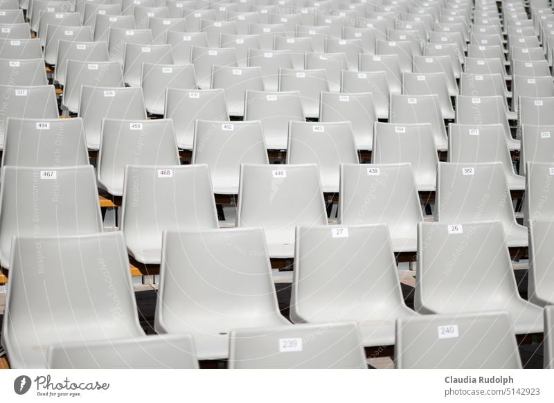 Diagonal view of empty white seats in stadium empty rows of seats Stadium seats White empty seats White seats Arrangement structure Structures and shapes