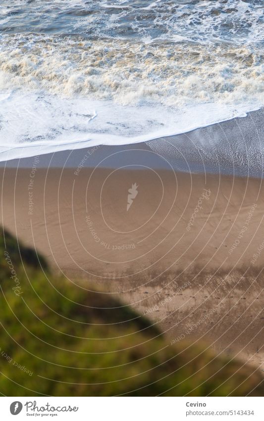 beach view Beach Looking Waves Water Sand rock Ledge Deep case downstairs Downward Downward trend Dangerous peril Wet Damp Salty salt water North Sea Denmark