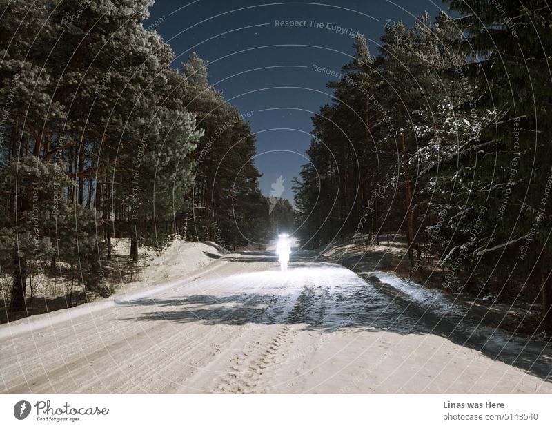 There is an odd happening on this remote snowy road. Surrounded by majestic woods there is a strange figure enlightened. It’s a mysterious object and strange things are happening here in general.