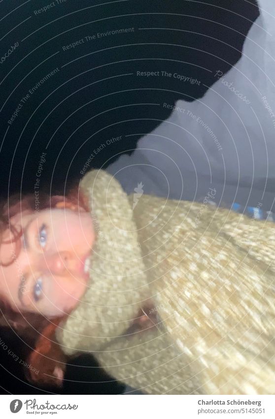 cold night Night Scarf Green blue eyes Blue Sky Dark Perspective from below Face Head Sweater red hair Exterior shot Woman Colour photo Looking