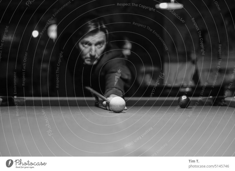 a man at a billiard table Roadhouse Pool (game) Billard bowle b/w Prenzlauer Berg Berlin Night Man Town Downtown Capital city Black & white photo bnw