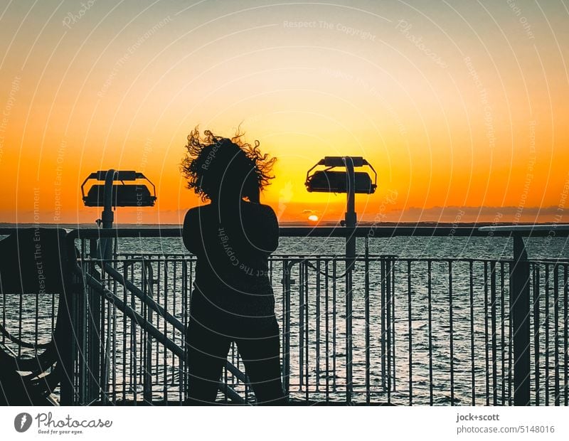 mindful travelers photograph the sunset Woman Sunset Ocean Tasman Sea Evening Romance Horizon Cloudless sky Vacation & Travel Sunlight Railing Silhouette