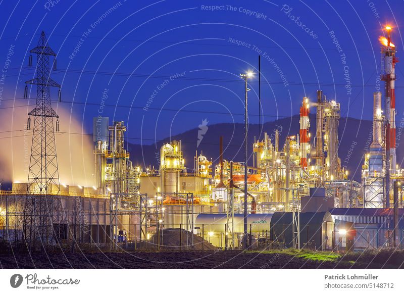 Industrial skyline Chemical factory Chemistry Night shot Industry Industrial plant France Illuminated clearer Smoke steam blue hour Sky Blue Factory