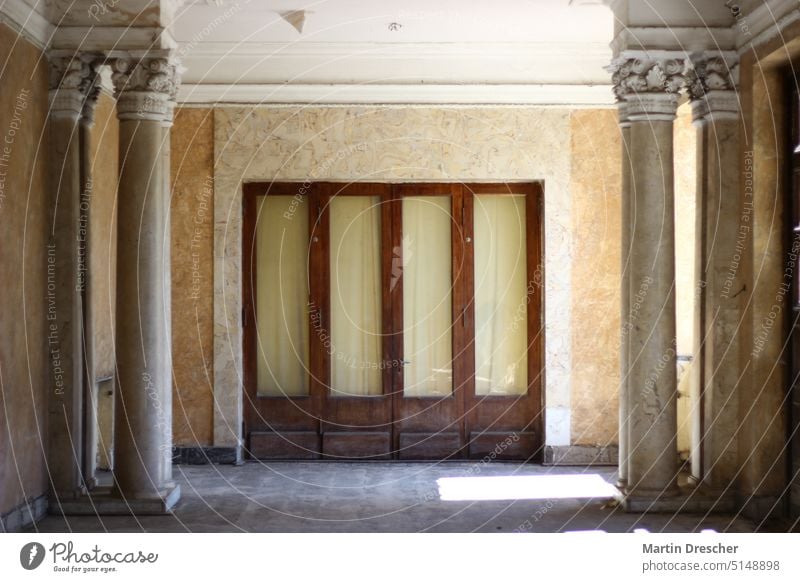 Door in abandoned hotel door Hallway gate Ballroom columns lost place Hotel Stucco forsake sb./sth. Window Majestic hallway Old Past Change Building Derelict