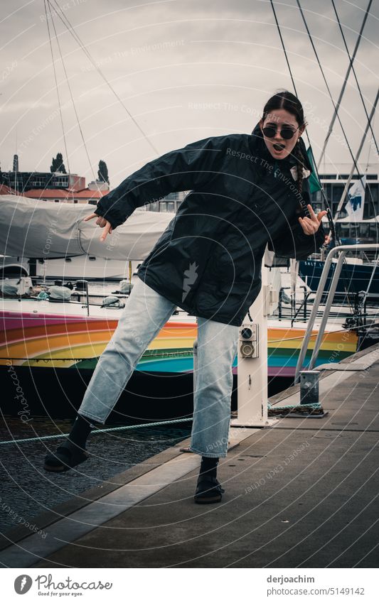 Finally back on land. Girl still stands swaying on the quay. girl Day Human being Colour photo Feminine Joy Young woman Happiness Exterior shot