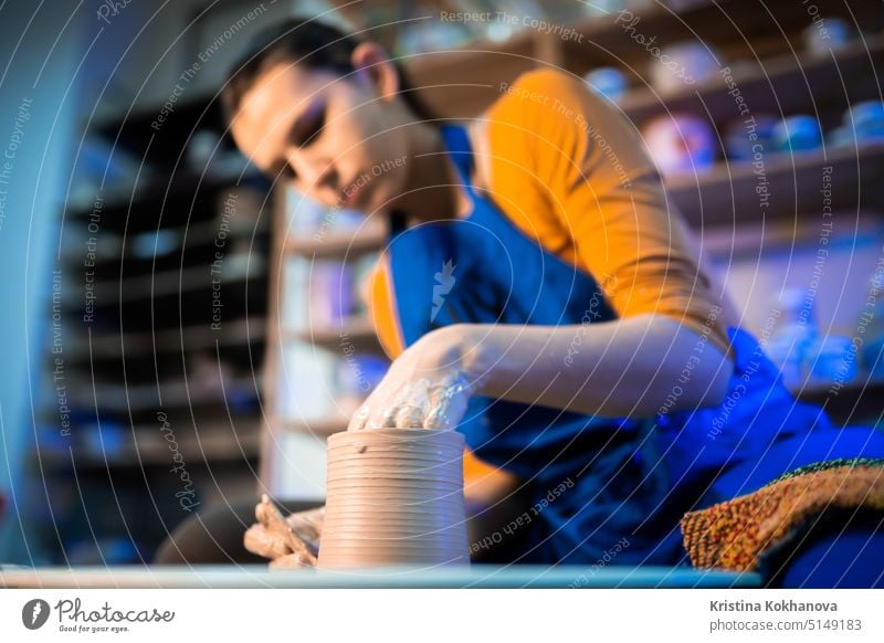 Woman artisan working with ceramic clay pot. artist bowl closeup craft craftsman creation creativity dirty form hand handicraft handmade hobby making molding