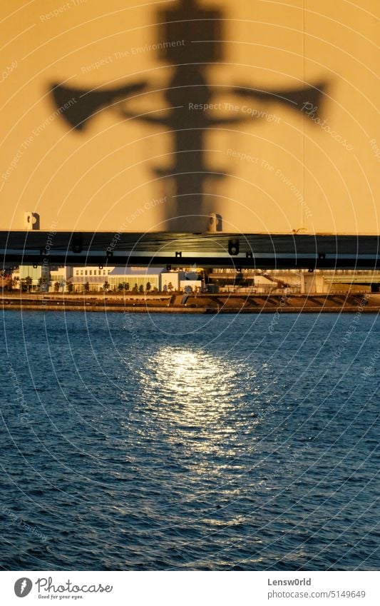 shadow plays on rainbow bridge over Tokyo Bay in Tokyo, Japan Tokyo Bay Connector Bridge Rainbow tokyo bay Harbour Sunset Shadow Shadow play Water coast