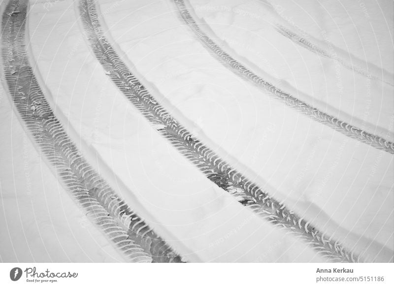 Tire tracks running side by side in the snow Skid marks Snow Snow track snow-covered Snow layer Side by side snowy snowy ground Driveway Winter onset of winter