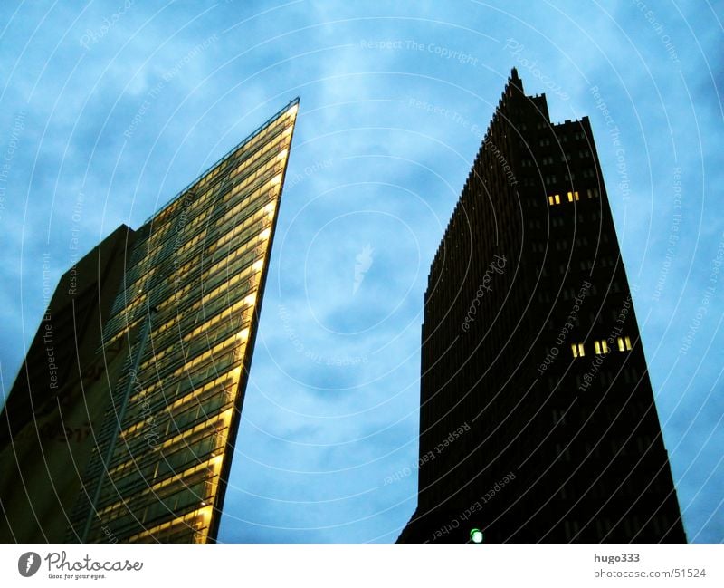 two giants High-rise Dark Threat Large Black House (Residential Structure) Potsdamer Platz Berlin skyscaper Sky Blue aberrant lines Light Few