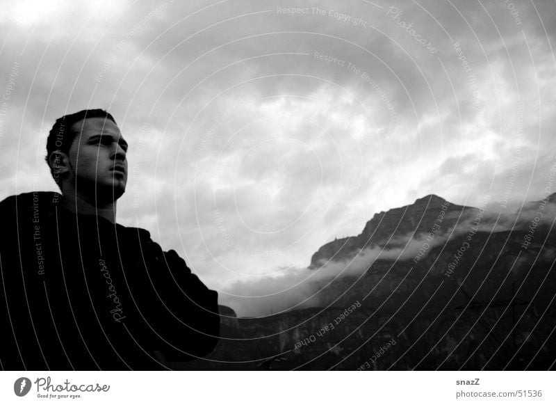 Far away. . . . Man Black White Clouds Far-off places Calm Jacket Italy Portrait photograph snazz upset Mountain Sky Power Graffiti Bright external portrait