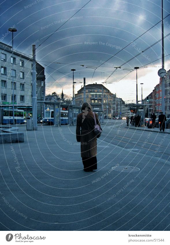 monday morning Town Woman Clouds Tram Bag Coat Loneliness Future Transport Clock Commute Grief Stop Zurich Blue Sky Wait Station Human being Morning Driving