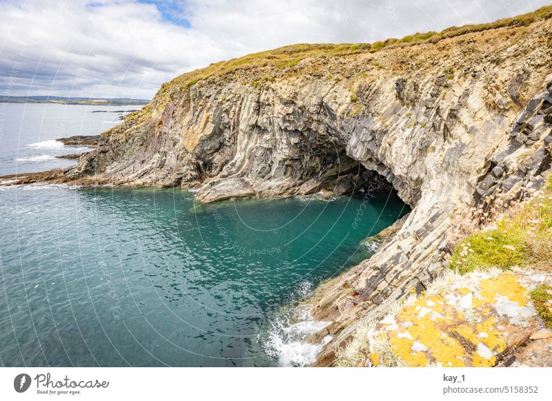 Coastal Landscape in Ireland coast coastal landscape Rock rocky coast Wall of rock Ocean Water Atlantic Ocean Nature Clouds Day Vacation & Travel Cliff Island