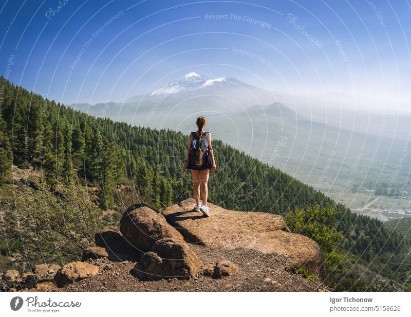 Young woman hiking on the volcano Teide, Tenerife, Spain adventure female girl lifestyle mountain nature person spain teide tenerife young active beautiful