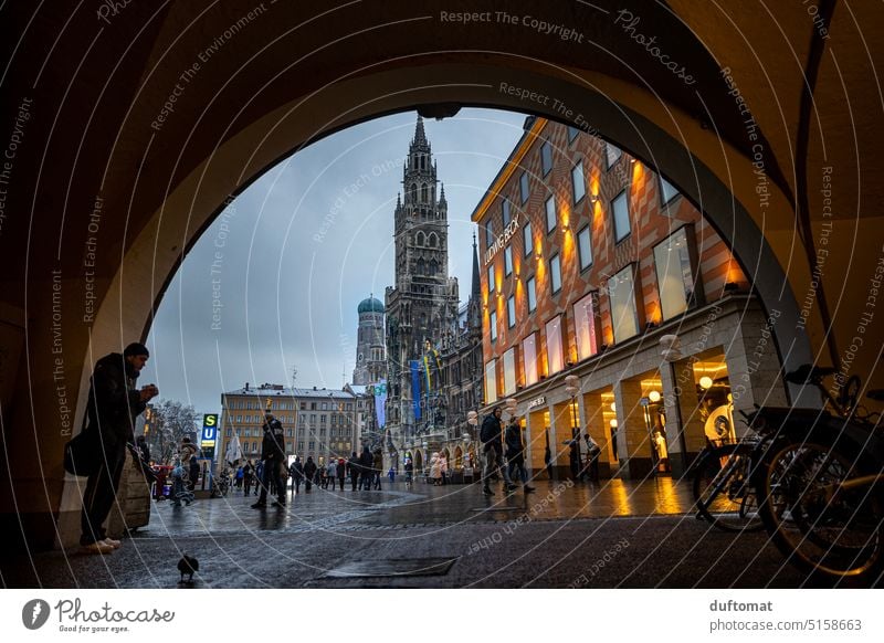 Evening atmosphere with rain Munich Marienplatz Street Wet Rain urban off City Asphalt Pedestrian Exterior shot Town Covered Cold cold and damp somber