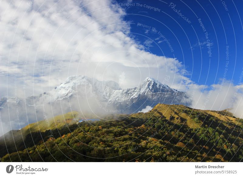 CLOUDS ARE COMING UP Peak Mountain Himalayas Snowcapped peak Day Sky Rock Landscape Nature Deserted Nepal Environment Hiking Adventure Vacation & Travel