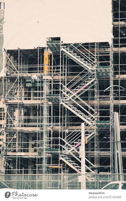 Large steel scaffolding with stairs staircase stands in the city of Christchurch. Scaffold Architecture Building Construction site Scaffolding