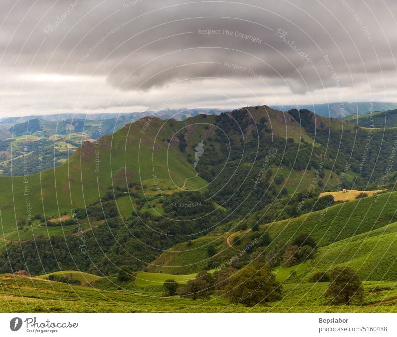 Mountain landscape, along the Way of Saint James. French Pyrenees hill scenery scenic france green nature sky french rural cloud valley peak hiking pilgrimage