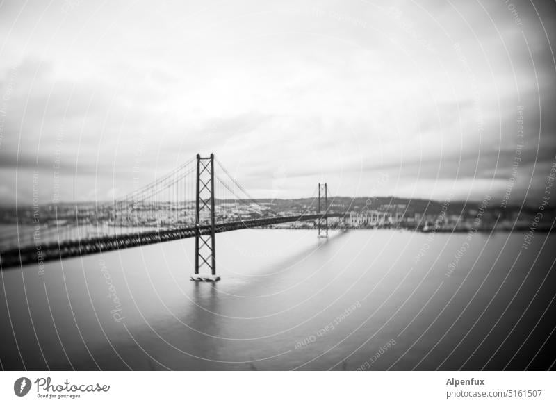 the transition | color reduced Bridge River Town Exterior shot Sky Water beyond Architecture River bank Deserted Landmark Lisbon Portugal Europe