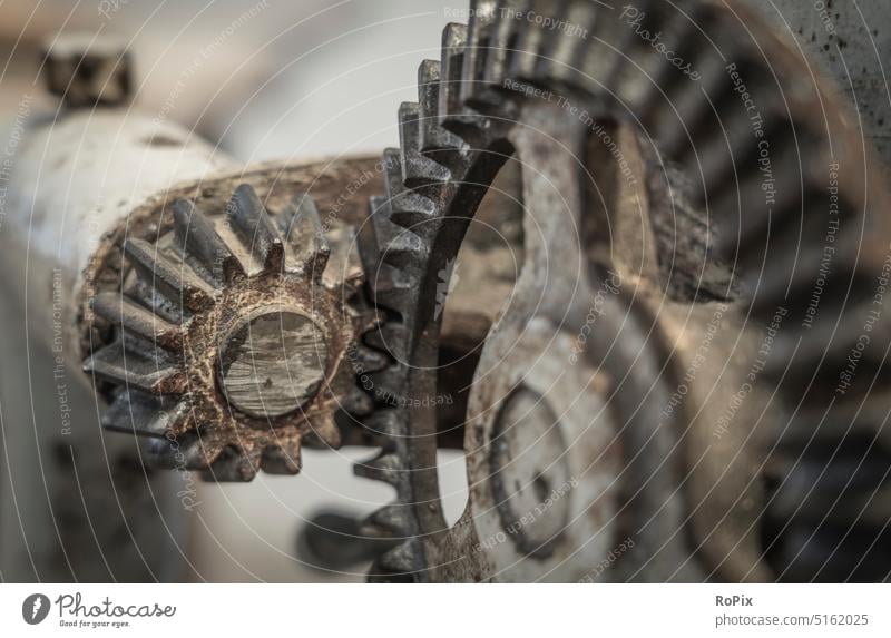 Bevel gearbox of a historical machine. Gear unit Gearwheel gearing Mechanics technique Machinery structure dovetail cogwheel gearwheel clockwork translation