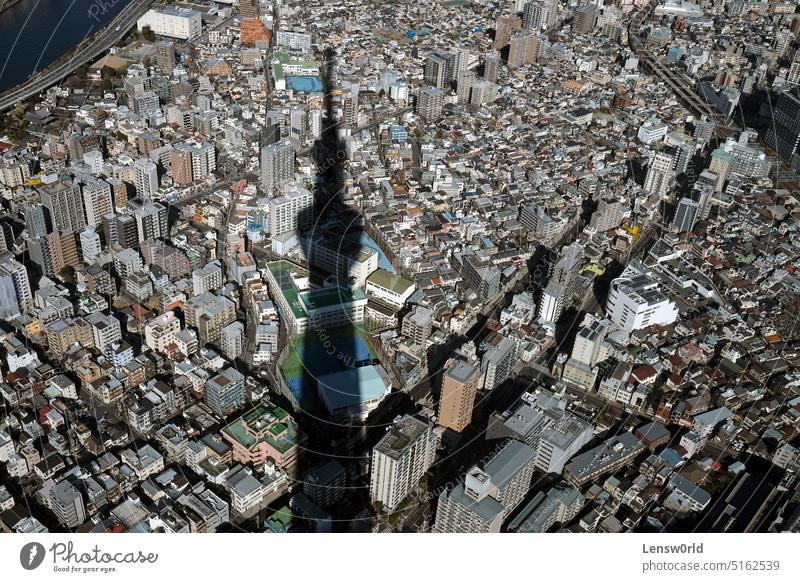 View over the cityscape of Tokyo from a tall building aerial architecture dense population downtown skyline skyscraper tokyo tower urban view shadow Tall