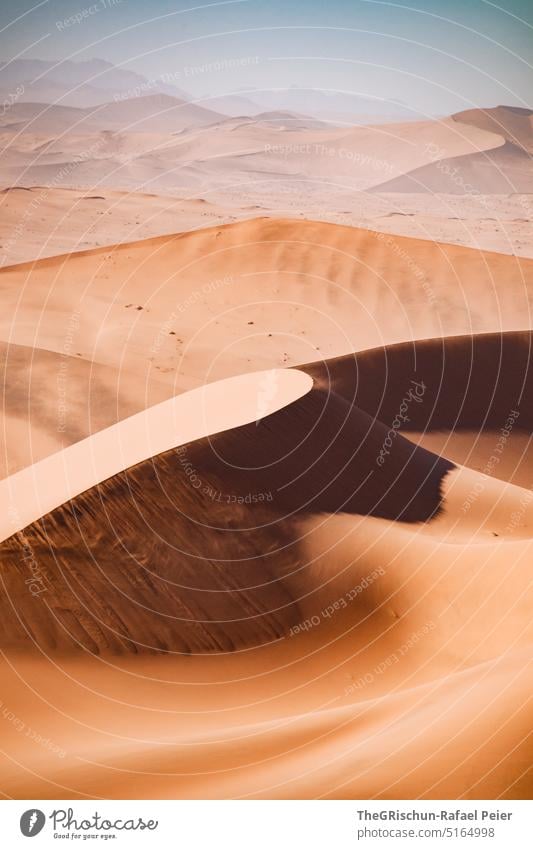 Sand dunes against cloudy sky Namibia Desert Sossusvlei duene Dry Hot Africa Landscape Nature Far-off places Warmth Namib desert Adventure Loneliness