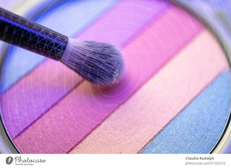 Close up of brush in front of powder compact with make up in rainbow colors Prismatic colors make up brush powdery Powder Make-up Colour make-up Cosmetics