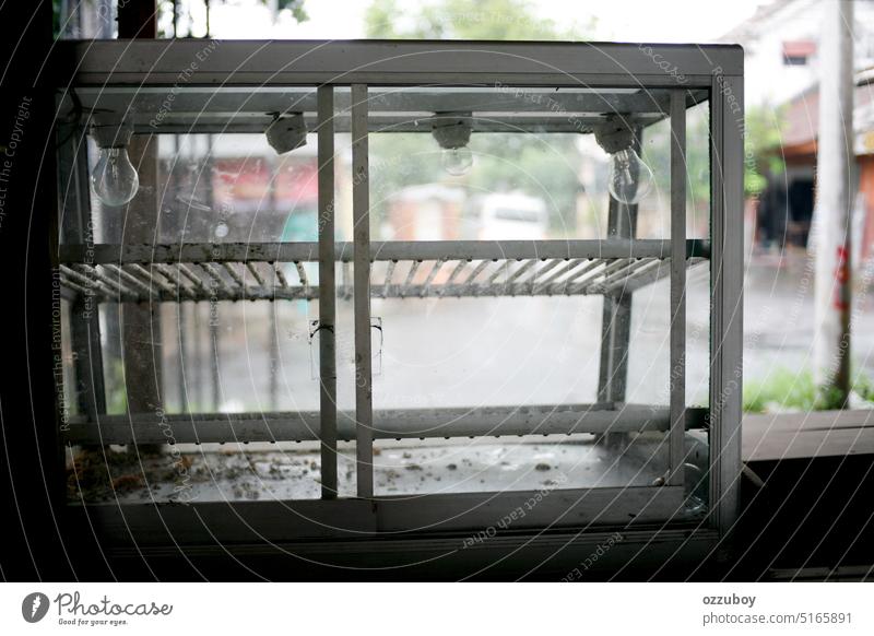 Empty and abandoned display showcase of street food stall store shelf empty isolated equipment glass commercial retail shop market white product design