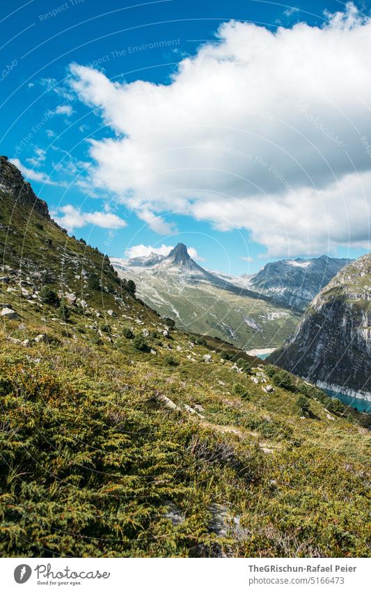 Mountain with clouds and lake in background Vals Alps Exterior shot Day Deserted Landscape Switzerland vacation Hiking Discover Bergen cloudy Nature