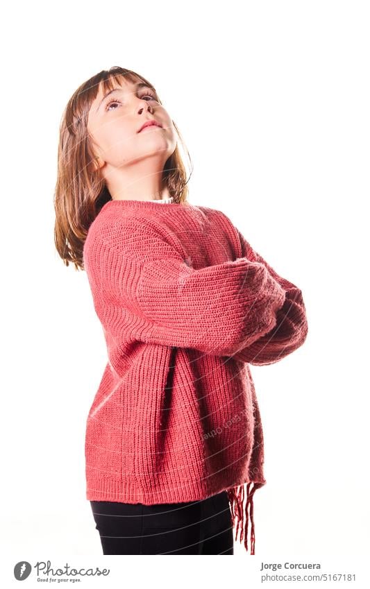 Girl 6-7 years looking up. Perfect portrait for advertising and commercial posters copy space age child small positive pretty white cheerful girl gesture posing