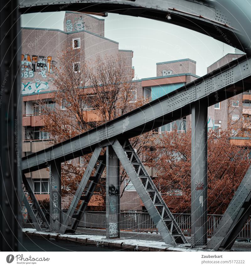 View through steel truss structures of Swinemünde bridge to residential buildings and trees Bridge Steel steel framework Swinoujscie apartment buildings