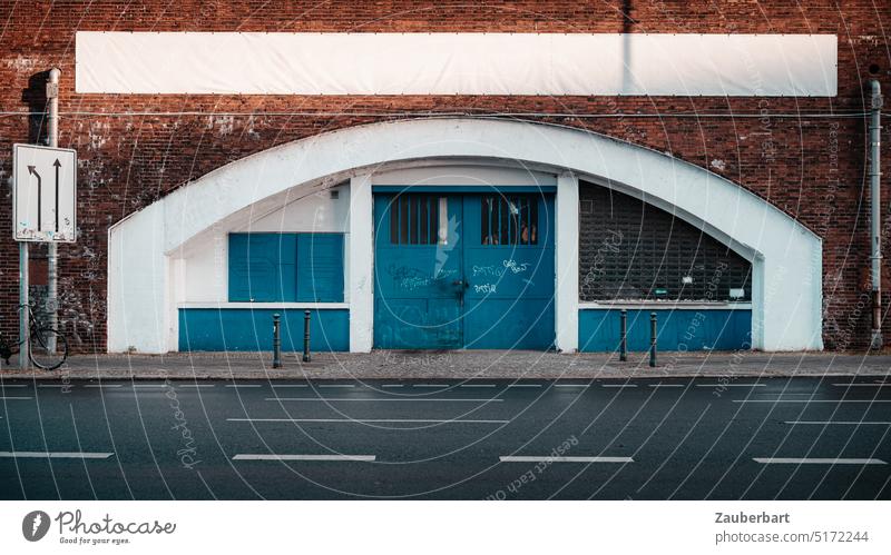 Blue gates and windows in urban railroad arch on brick wall Goal Window Commuter trains S-Bahn Arc Arch White Brick red Architecture Town City Capital city