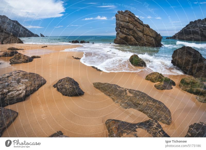 Rock on the Adraga beach -praia da Adraga Sintra, Portugal portugal travel rock sintra adraga ocean landscape nature waves sand water coast atlantic sea sky