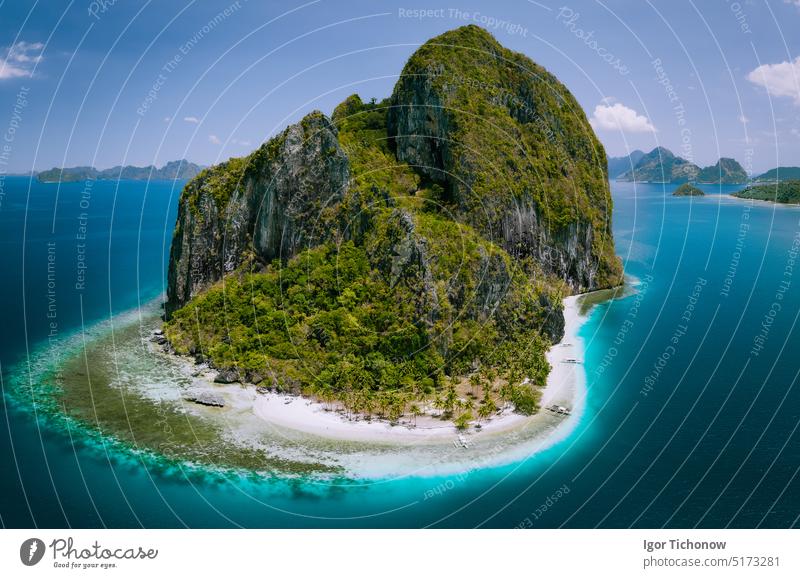 El Nido, Palawan, Philippines. Aerial drone above shot of impressive Pinagbuyutan Island. Amazing white sand Ipil beach with turquoise blue water around