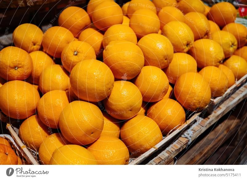 Bunch of orange in supermarket or market. Sale of healthy product, vitamins fruit store food shelf fresh buy organic retail marketplace purchase shop color