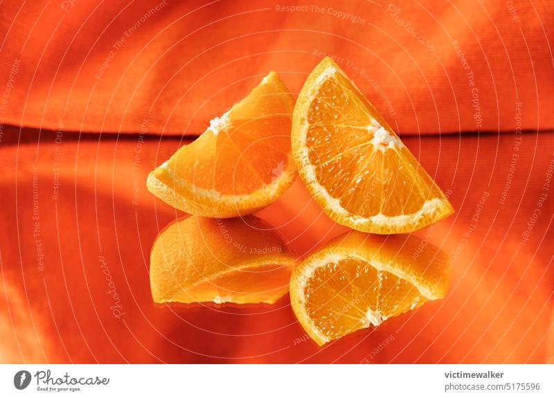 Slices of orange fruit food healthy slice of food orange color copy space orange background ripe vegetarian citrus fruit mirror reflection front view nutrition