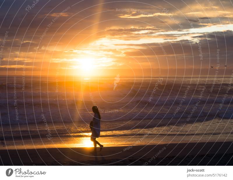 Walk with sun rays at sunrise on the beach Woman Sun Beach Ocean Romance Vacation & Travel Relaxation Summer vacation Sunrise Sunlight Nature Freedom