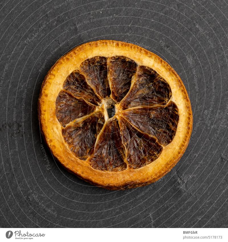 Dried orange slice on slate plate Organ Gene Disc Eating Nutrition Deserted Vegetarian diet Healthy Eating Food photograph Organic produce Vegan diet Cooking