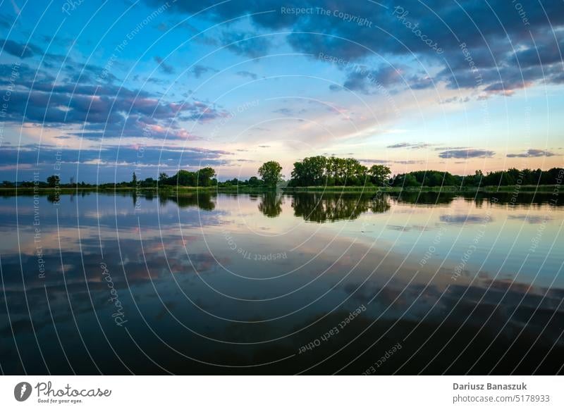 Reflection of evening clouds in the water of a calm lake, Stankow, Poland nature sky sunset reflection blue outdoor twilight landscape summer background