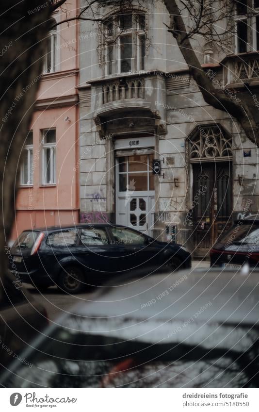 City view Prague historical buildings street with cars in foreground Analogue photo Czech Republic Travel photography Card Europe Town City trip cityscape