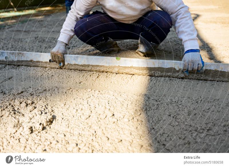 Worker is leveling fresh concrete after pouring Align Base Builder Building Site Cement Civil Engineering Concrete Concreting Construction Equalization