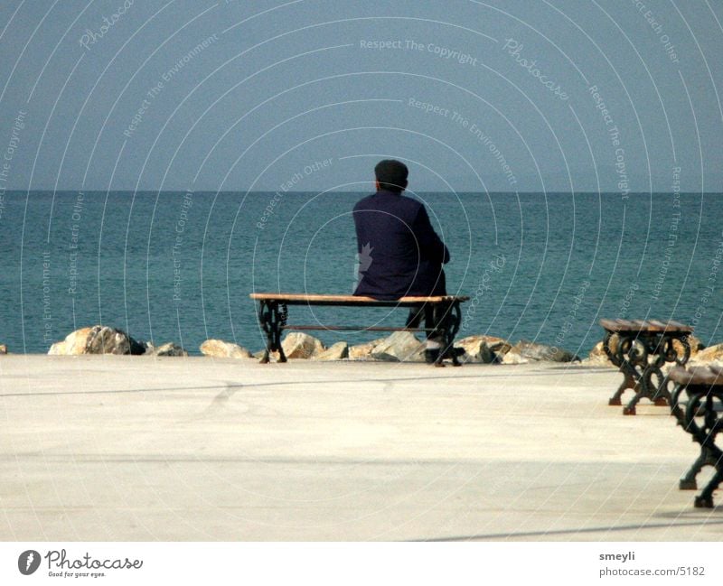 wanderlust Senior citizen Ocean Think Loneliness Wanderlust Beach Vacation & Travel Promenade Vantage point Man Horizon Grief Distress Male senior Bench Sky