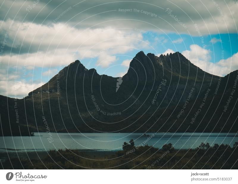 Cradle Mountain with Dove Lake Landscape Nature Sky Blue sky Clouds Back-light Silhouette Shadow Panorama (View) Authentic Neutral Background Mountain range