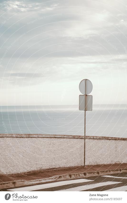 Street by the ocean, minimal infrastructure and driving concept road sign traffic sign street street view minimal aesthetic minimalist beige neutral