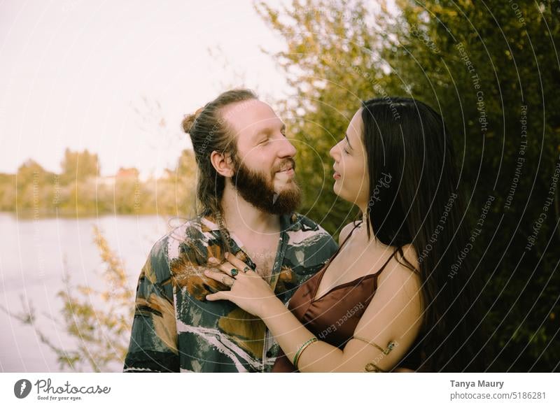 photoshoot of a couple in summertime by the river love happy woman together cheerful people caucasian adult young relationship lifestyle smiling family