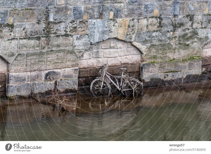 Rot date | emerged U-bicycle topic day Bicycle Scrap metal Old corroded Discovery surfaced Broken Rust Deserted Colour photo Exterior shot Day