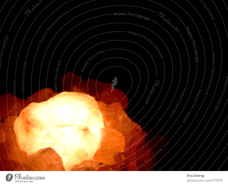 Light in the darkness Candle Dark Bright Stone Rock salt Salt Blaze