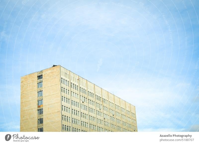 Soviet architecture details. Multistory university building view. soviet minimalism negative space blue sky roof tourism old buildings structure windows