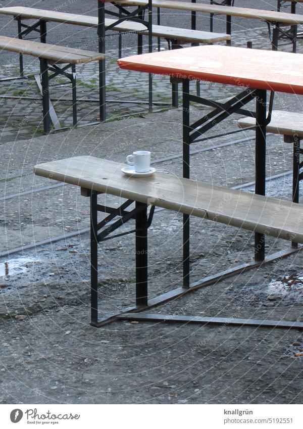 coffee break Coffee break Beer garden Coffee cup tables benches Empty Bad weather Puddle Garden restaurant Metal Wood Saucer drunk empty Closing time