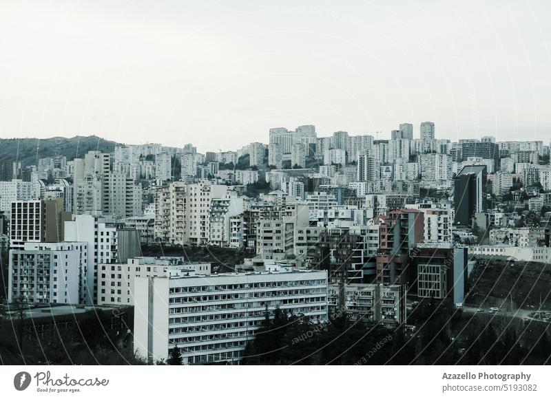 Urban landscape. abstract aerial architecture blue building business city cityscape clouds cloudscape construction dark district downtown dramatic evening sky